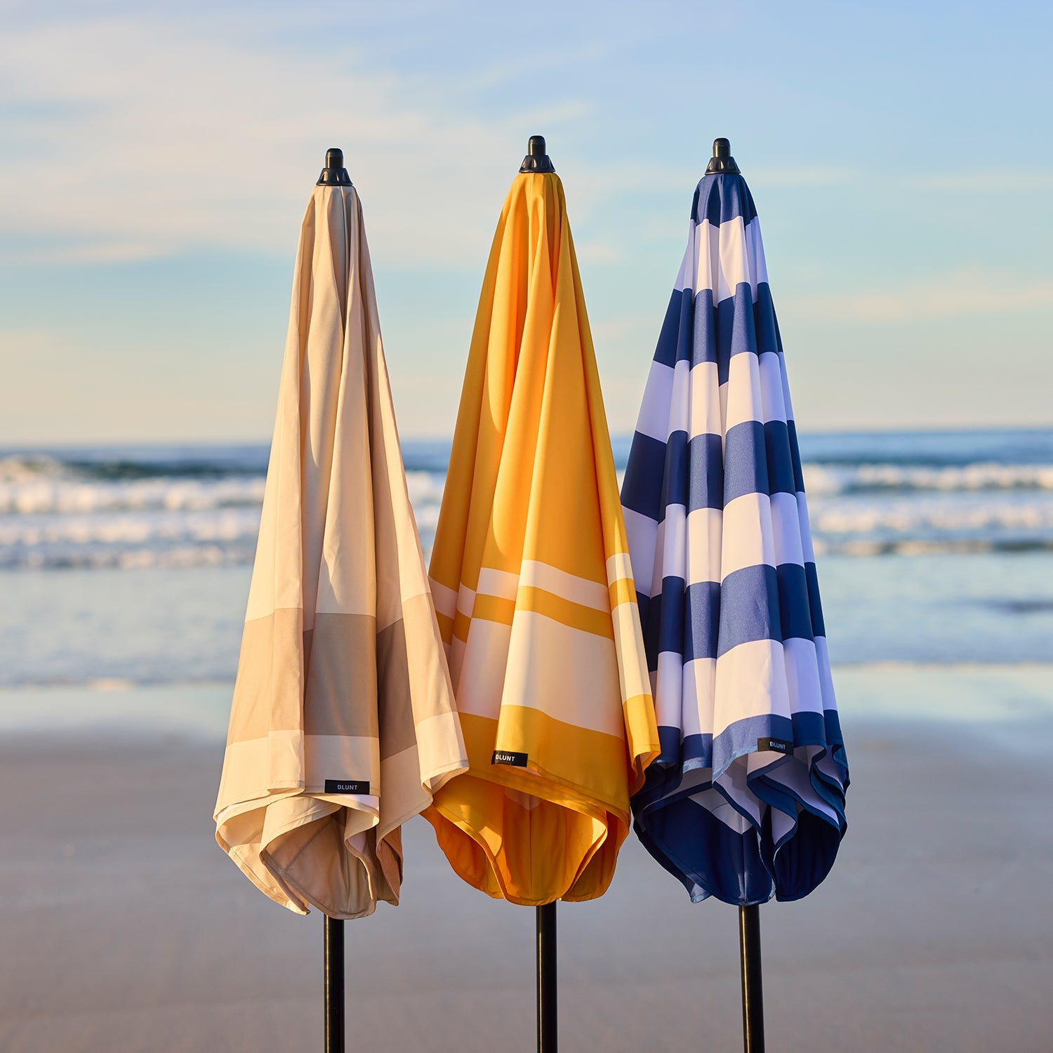 blunt | beach umbrella | sun