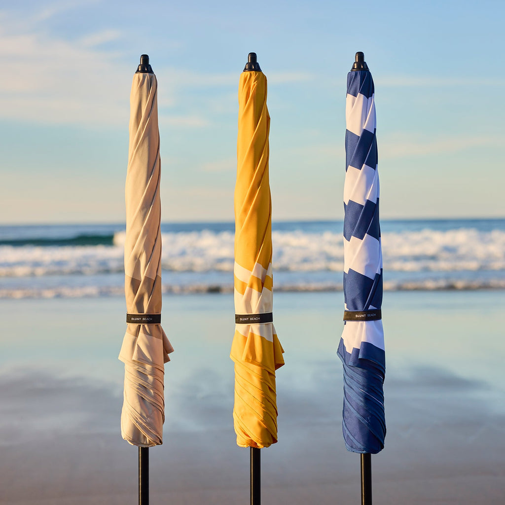 blunt | beach umbrella | sun
