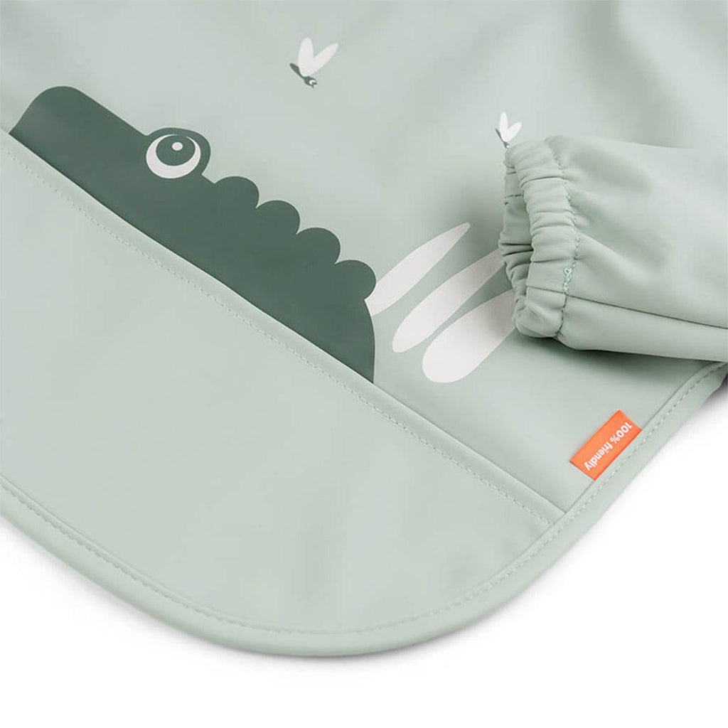 Done by Deer Sleeved Pocket Bib - Green - Croco